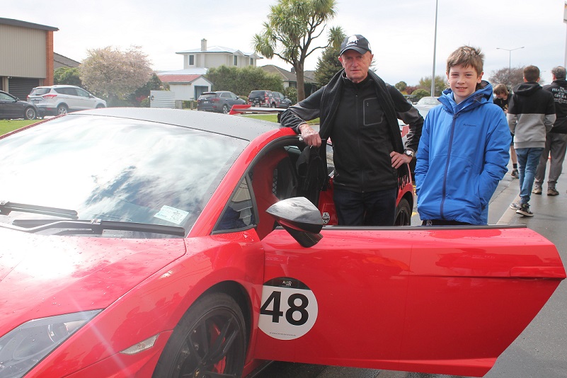 Cromwell man Steve Lyttle shows his Lamborghini to Bede Scully, of Invercargill.